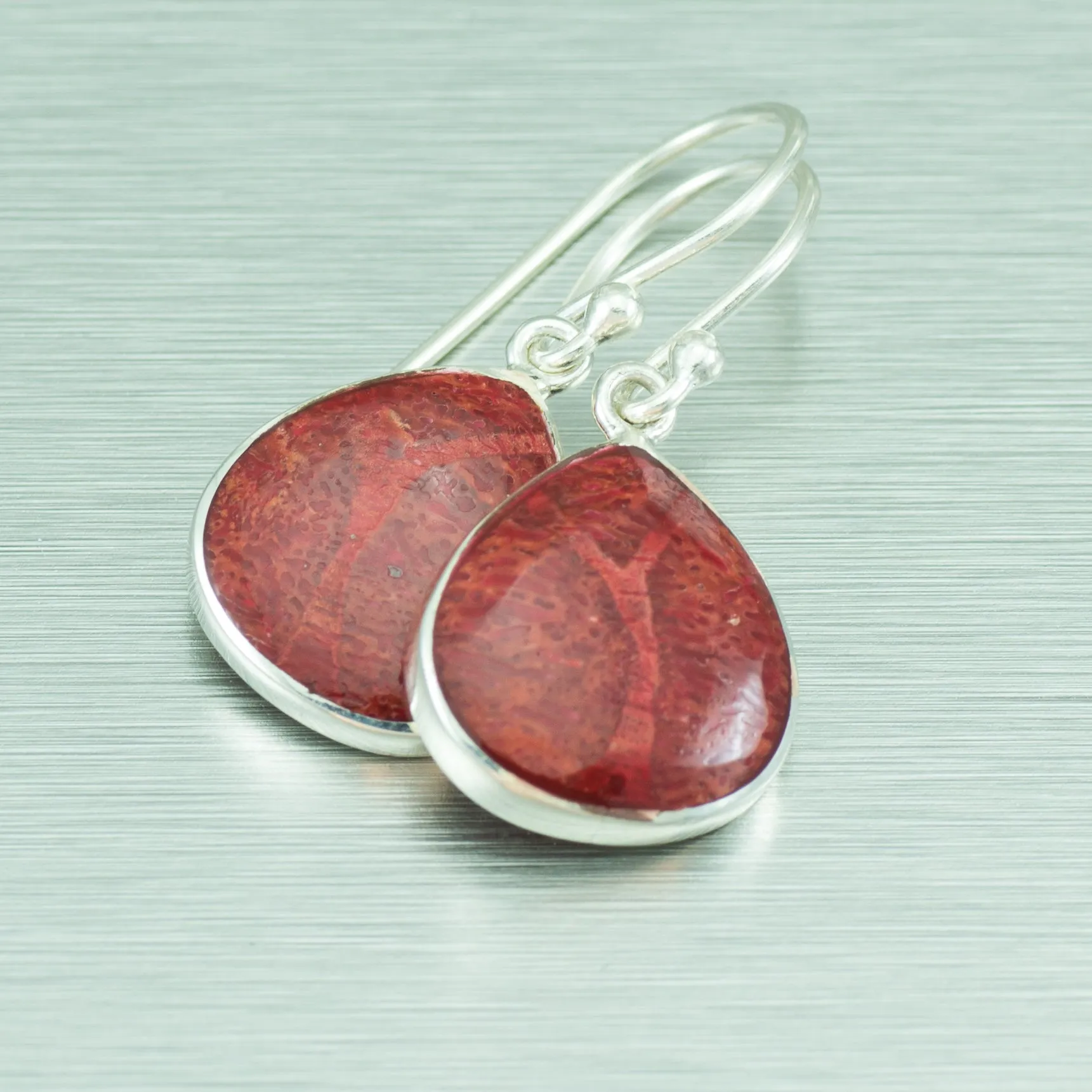 Coral teardrop silver dangle earrings