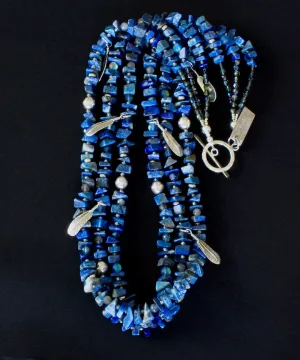 Lapis Lazuli Nugget 3-Strand Necklace with Bench-Made Sterling Silver Rounds, Sterling Silver Feather Charms, Translucent Blue Crystal Rounds, Labradorite Faceted Rounds, Fire Polished Glass, and Hammered Sterling Silver Toggle Clasp