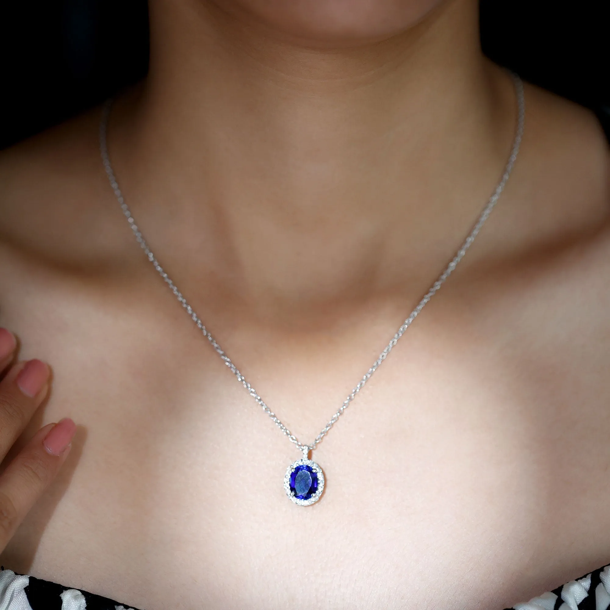 Oval Cut Created Blue Sapphire Silver Halo Pendant with Moissanite