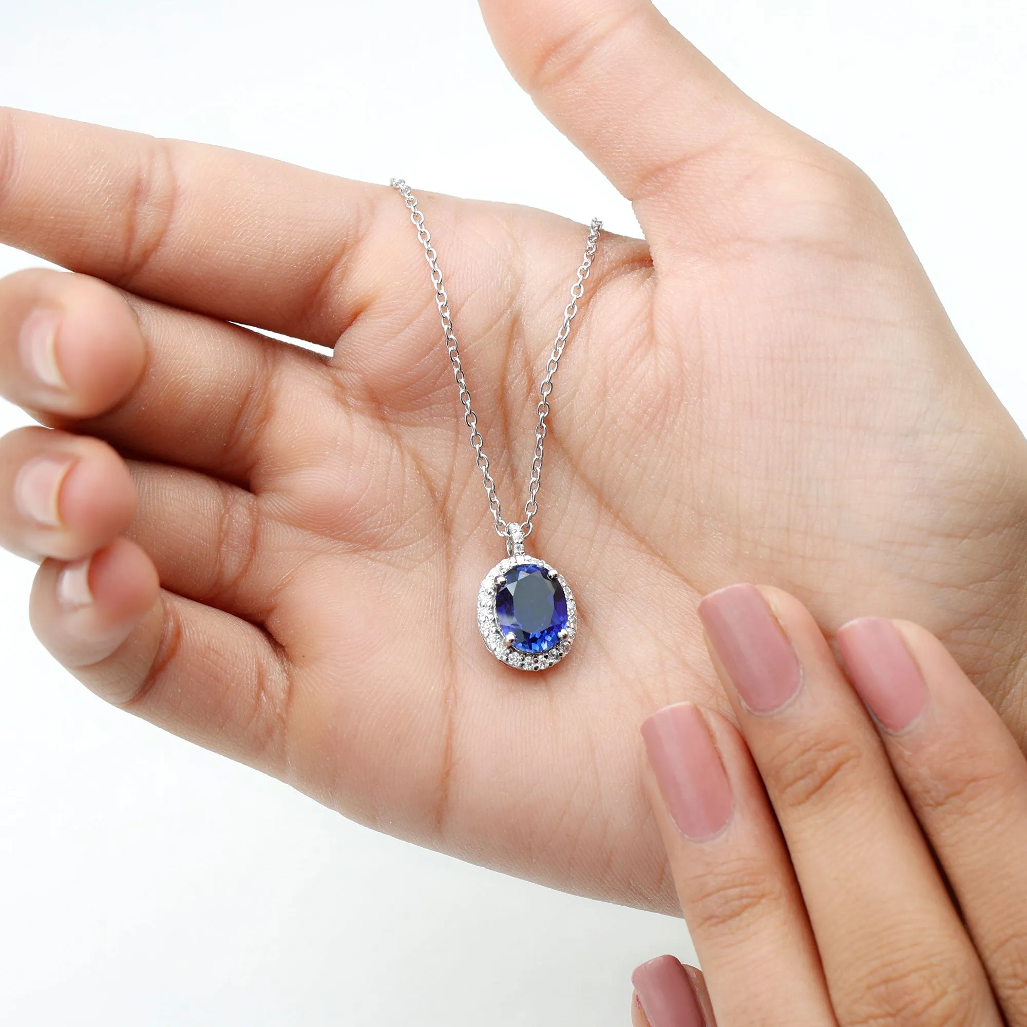 Oval Cut Created Blue Sapphire Silver Halo Pendant with Moissanite