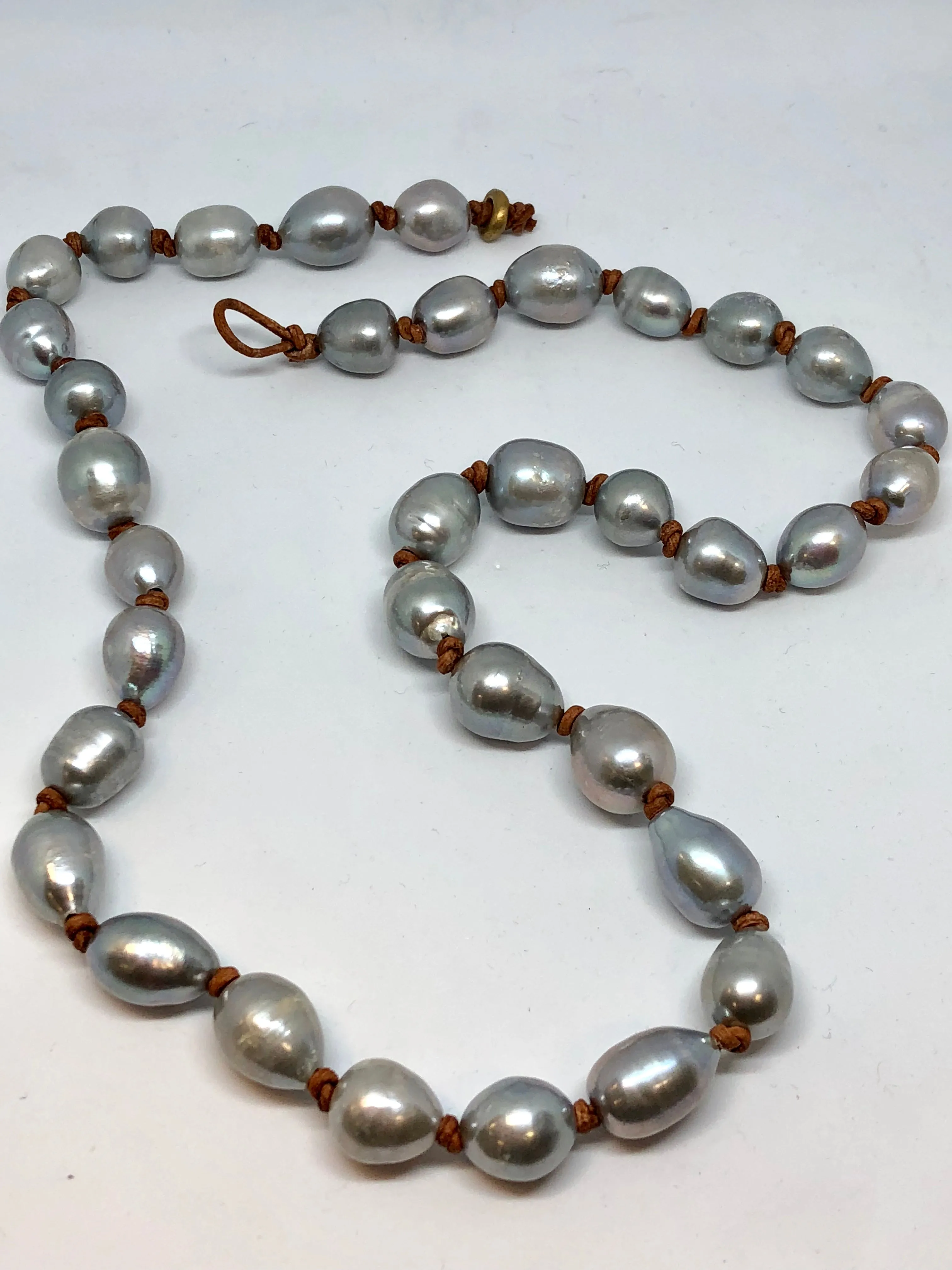 Oval Freshwater Pearls on Leather